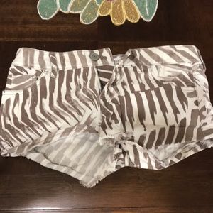 White and brown animal print shorts